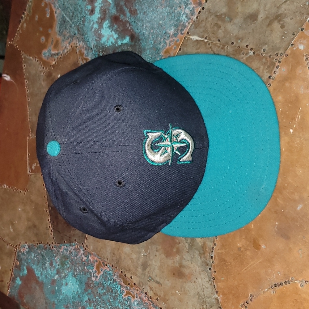 Vintage. Made in USA. New Era. Seattle Mariners on field cap. Fitted size 7 1/8.